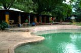 Shoestrings pool and bar Poolside and bar of Shoestrings Backpackers Lodge - backpacker and camping Victoria Falls accommodation