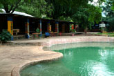 Shoestrings pool and bar Poolside and bar of Shoestrings Backpackers Lodge - backpacker and camping Victoria Falls accommodation