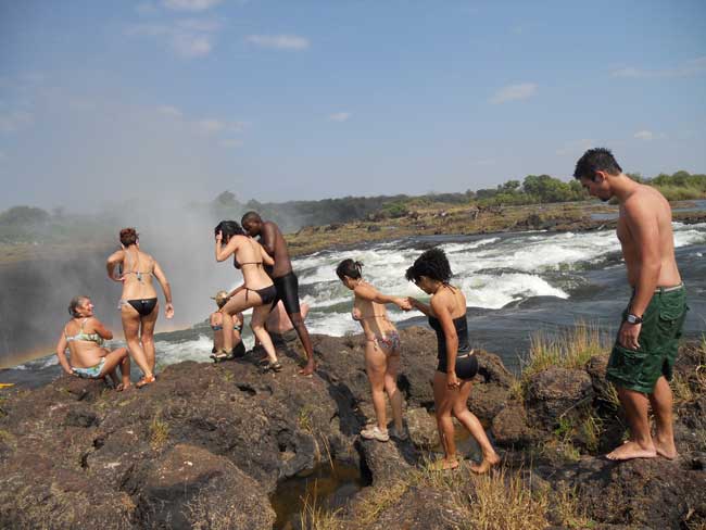 The trek across from Livingstone Island to get to Devils Pool Victoria Falls