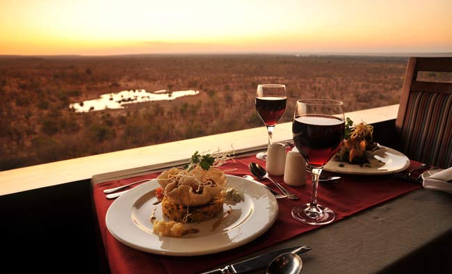 Sunset dining at Vic Falls Safari Lodge Sunset dining at Vic Falls Safari Lodge