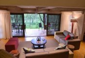 Victoria Falls Safari Suites - Victoria Falls, Zimbabwe Victoria Falls Safari Suites living room and veranda, Victoria Falls, Zimbabwe