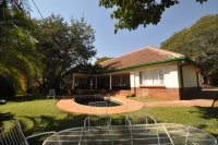 The pool and gardens at Livingstone Lodge Bed & breakfast and self-catering accommodation at Livingstone Lodge - Victoria Falls accommodation