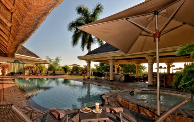 Poolside at Ilala Lodge - Victoria Falls accommodation Poolside at Ilala Lodge - Victoria Falls accommodation