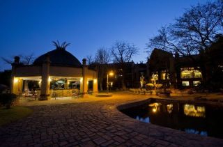 Dine on the deck of A'Zambezi River Lodge Hotel in Victoria Falls, with views of the Zambezi River - Zimbabwe