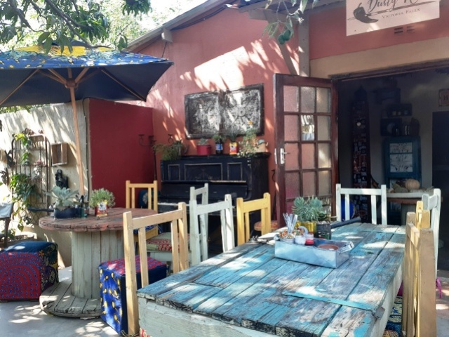 Tables set at Dusty Road township experience in Victoria Falls, ZImbabwe
