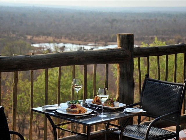 Lunch overlooking the Vic Falls Safari Lodge waterhole and Zambezi Naitional Park
