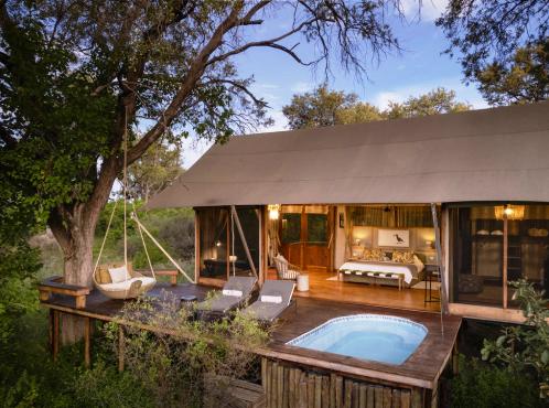 Tulidi Camp guest rooms with private deck and plunge pool in the Khwai Private Reserve, Botswana