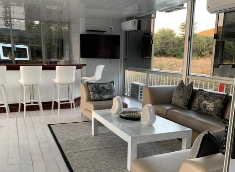 Meremaid houseboat covered lounge and bar area - Binga, Lake Kariba, Zimbabwe