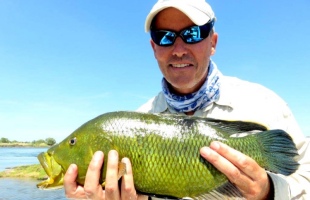 Zambezi River fishing in a boat - Victoria Falls