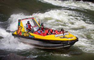 High speed jet boat below the Victoria Falls, Zimbabwe