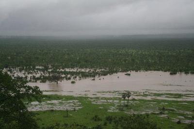 Sinamatella River in flood below camp. (Stephen & Sue Long)