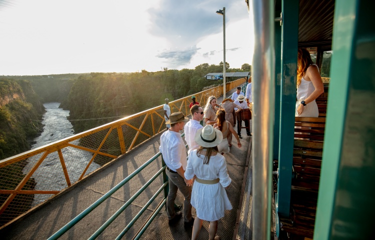 Guests enjoying the view of the Victoria Falls Bridge, and the tram trip from Victoria Falls in Zimbabwe