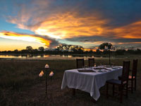 Dinner by the pan at Bomani Tented Lodge in Hwange National Park, Zimbabwe