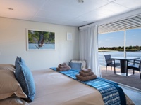 Inside a Chobe Princess room, on the Chobe River in Namibia. Chobe, Victoria Falls, Hwange safari.