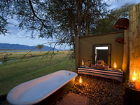 Safari bath at the luxurious Ruckomechi Camp in Mana Pools, Zimbabwe