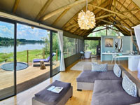 Victoria Falls River Lodge luxury suite with views of the Zambezi River, upstream from the mighty Victoria Falls, Zimbabwe
