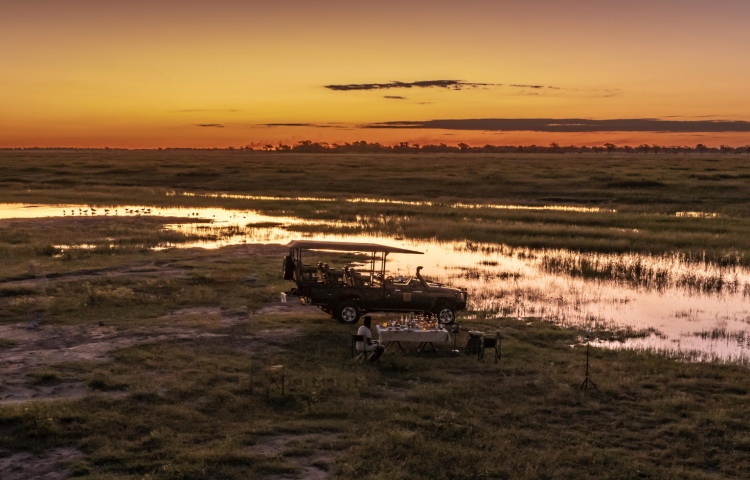 Sundowners on a game drive in Chobe, Botswana