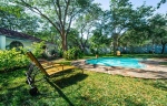 Surrounds a shaded garden
