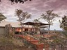Tented luxury lodge blends with the bush