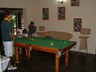 The pool table inside the main building