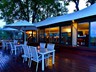 An evening view of the main lodge's deck