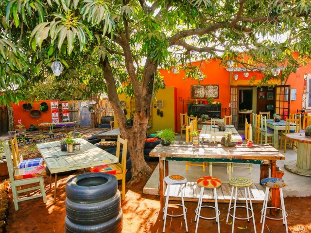 Bright coloured township restaurant in Victoria Falls, Zimbabwe - Dusty Road