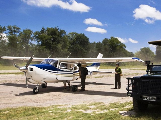 Light aircaft on landing strip