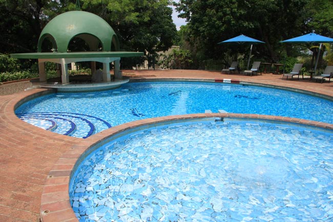 The pool with bar stools